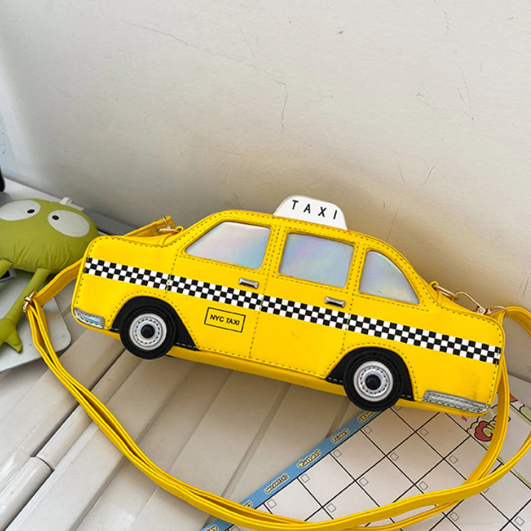 look urbain avec sac taxi