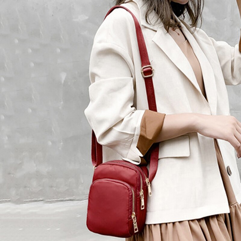 compact sac rouge multipoches