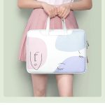 sac bandoulière ordinateur visage abstrait