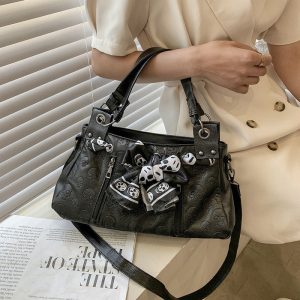 bandoulière tendance rock